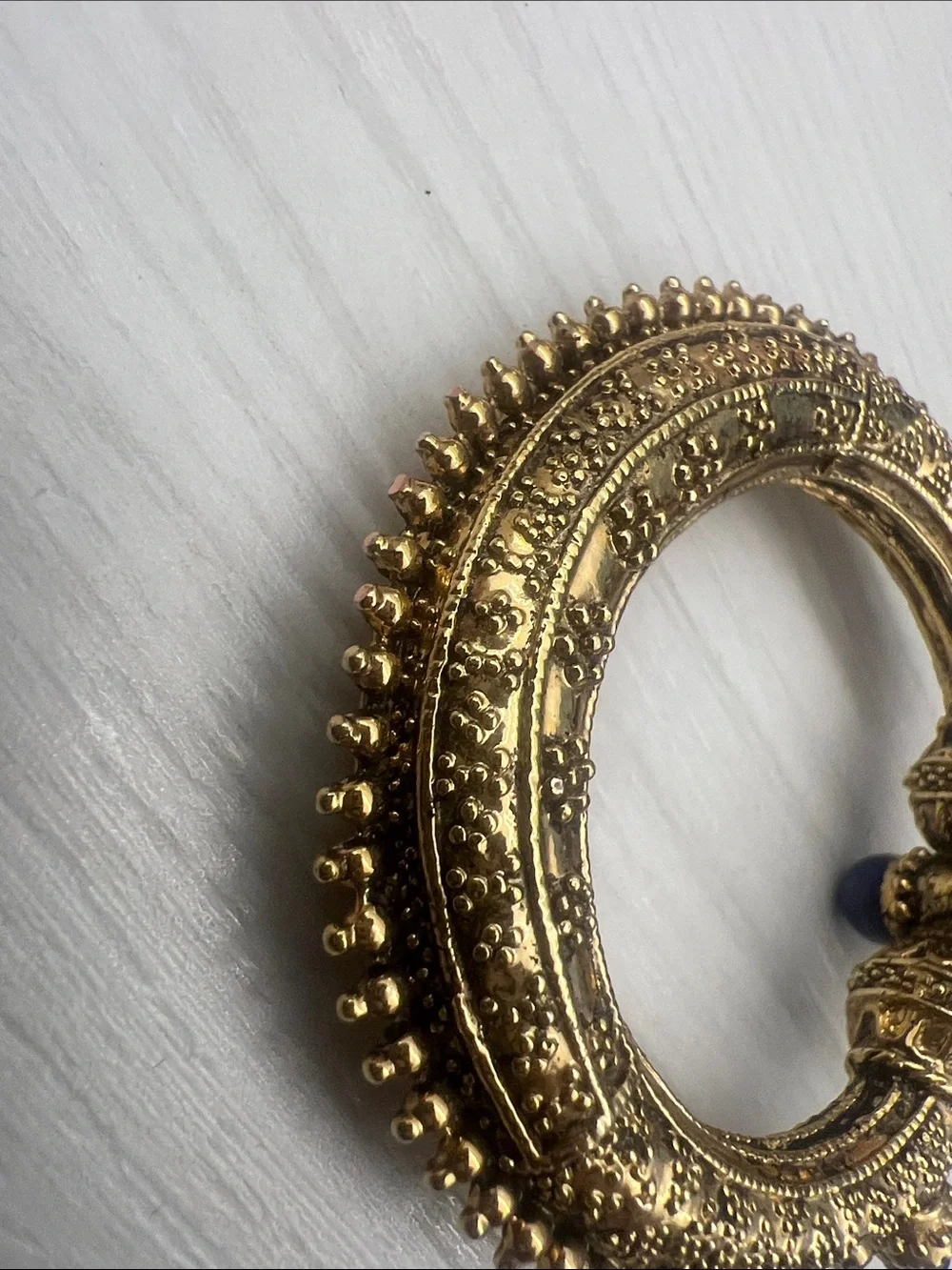 Gold-Tone Textured Hinged Bangle with Blue & Green Cabochons